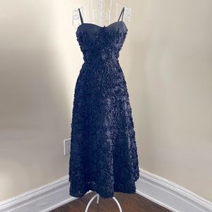 Unique Tea Length dress with 3D petals & sequin